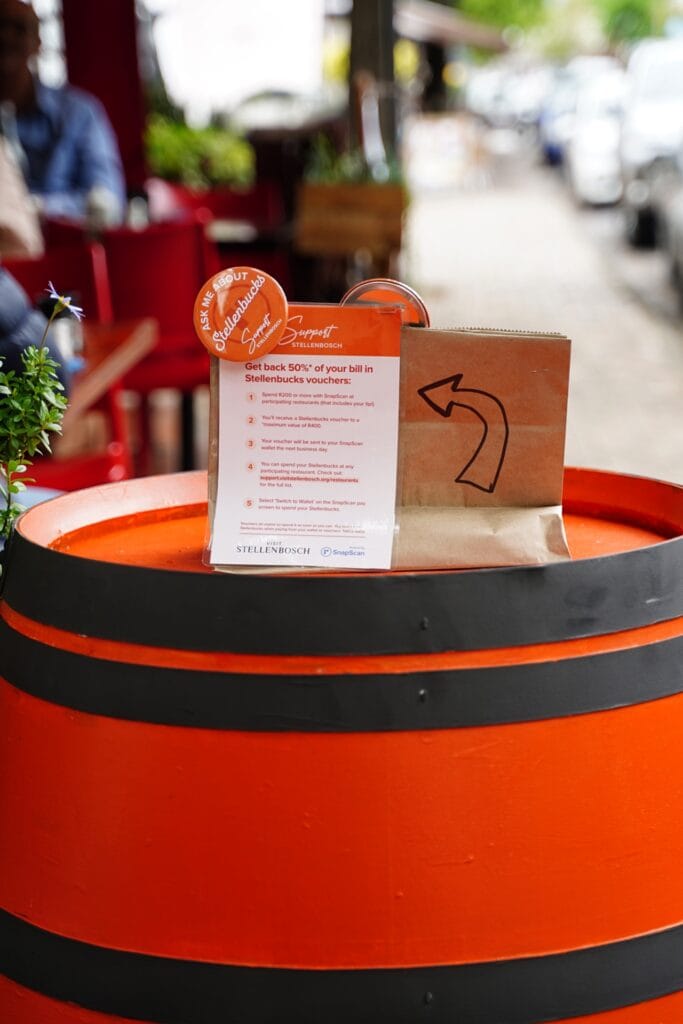 Visit Stellenbosch’s innovative 3-month campaign injected R7m into the local economy 1 Support Stellenbosch Orange Barrel with Sign Cred Vuurtoring